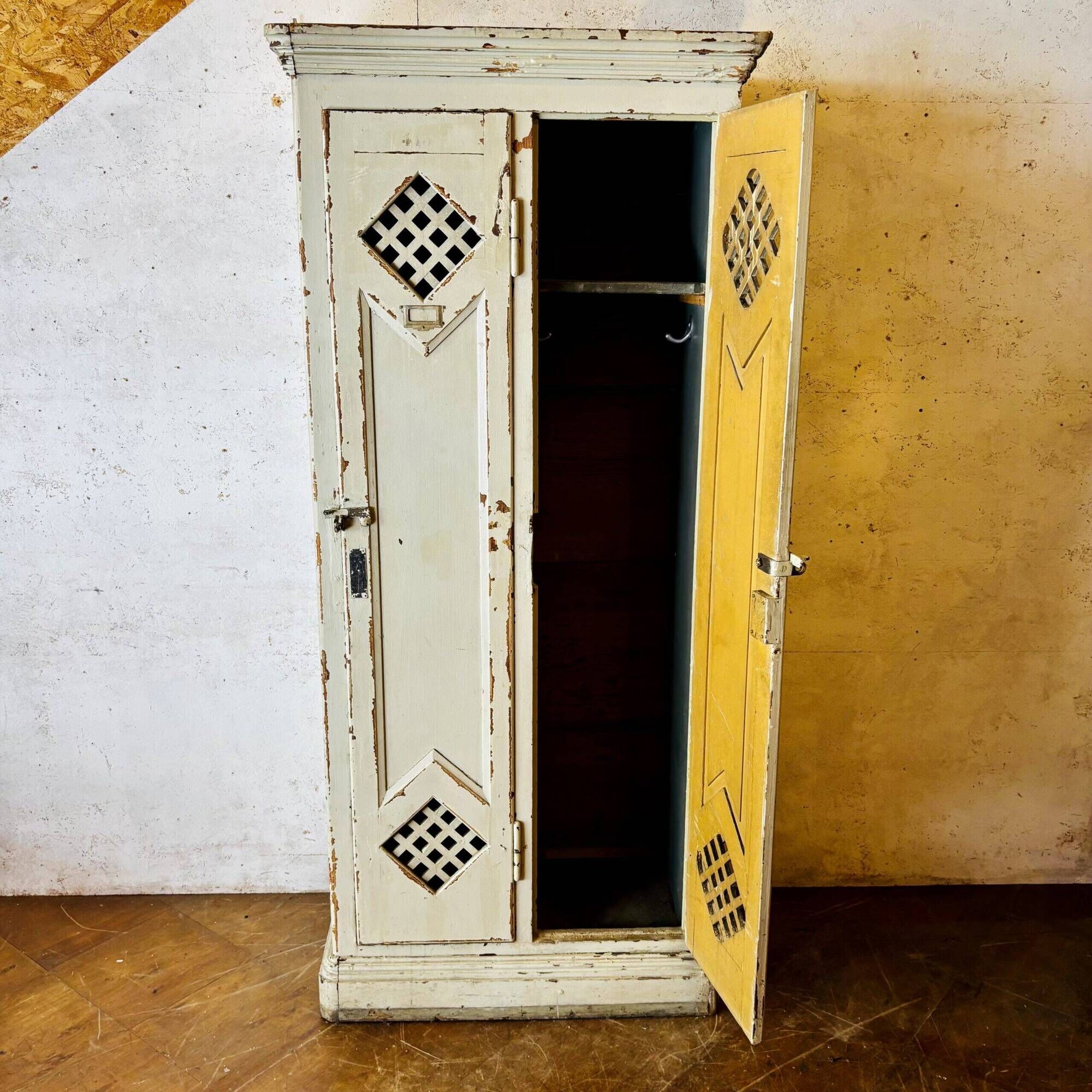 Old factory lacquered pine locker from early 20th century France.