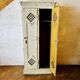 Old factory lacquered pine locker from early 20th century France.