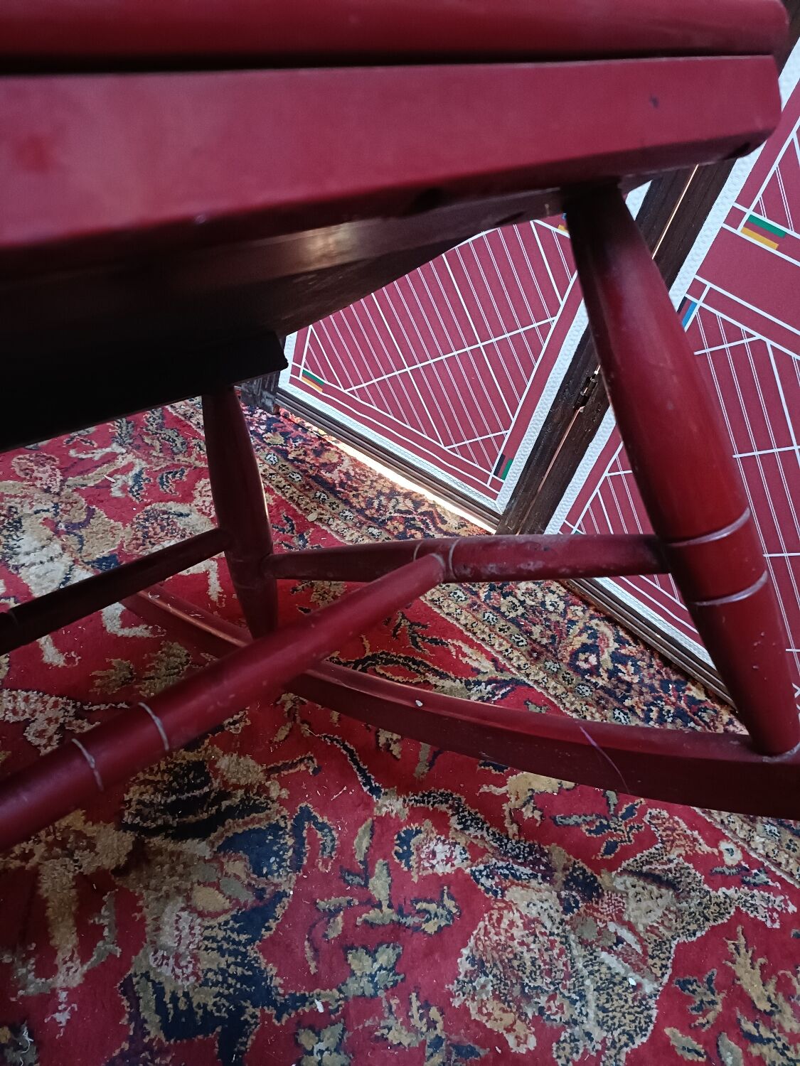 Vintage wooden rocking chair burgundy paint