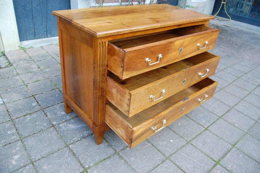 18th-century Louis XVI low walnut commode.