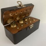 Balance weight in their wooden box