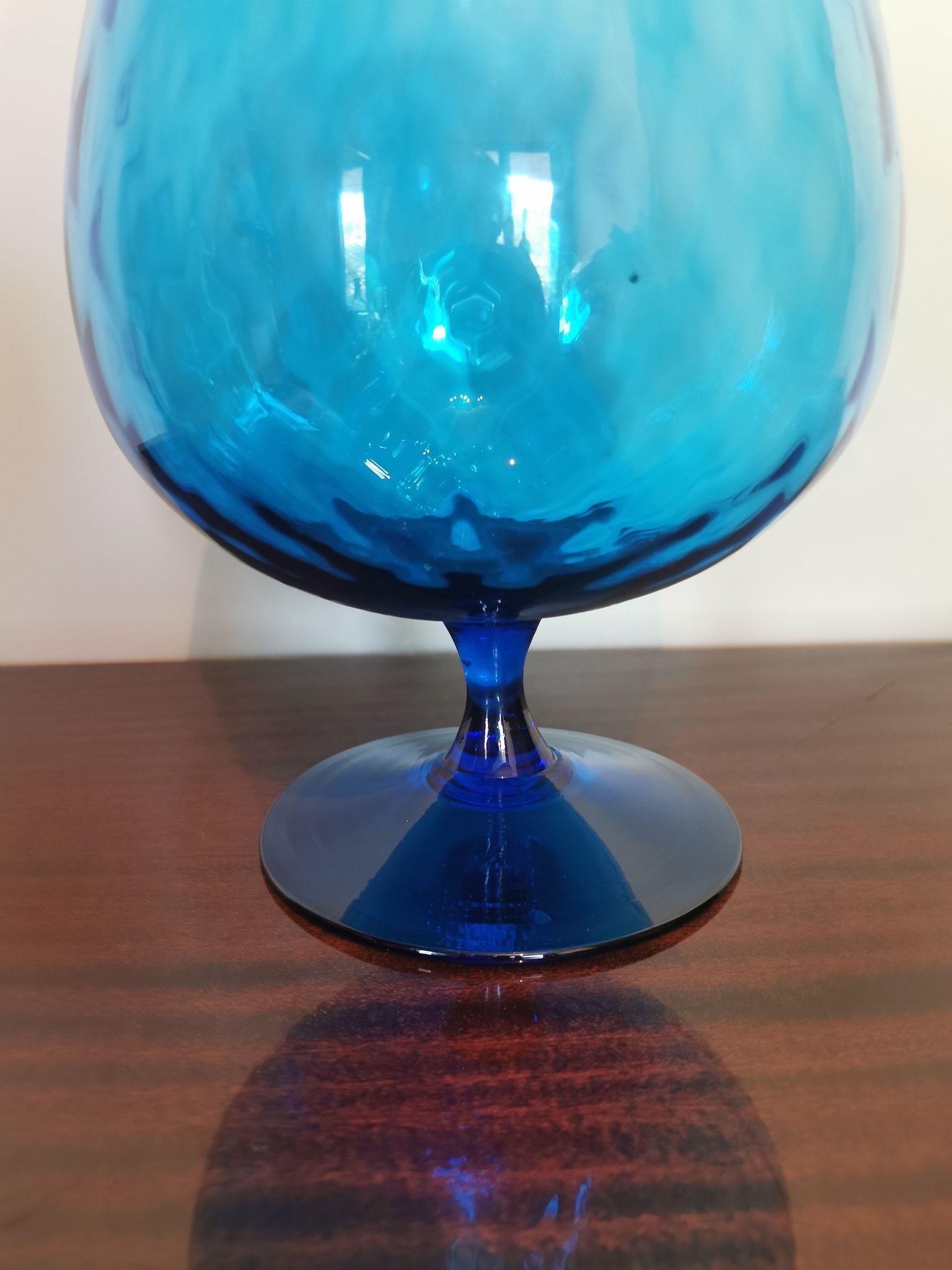 Vintage vase in light blue glass.