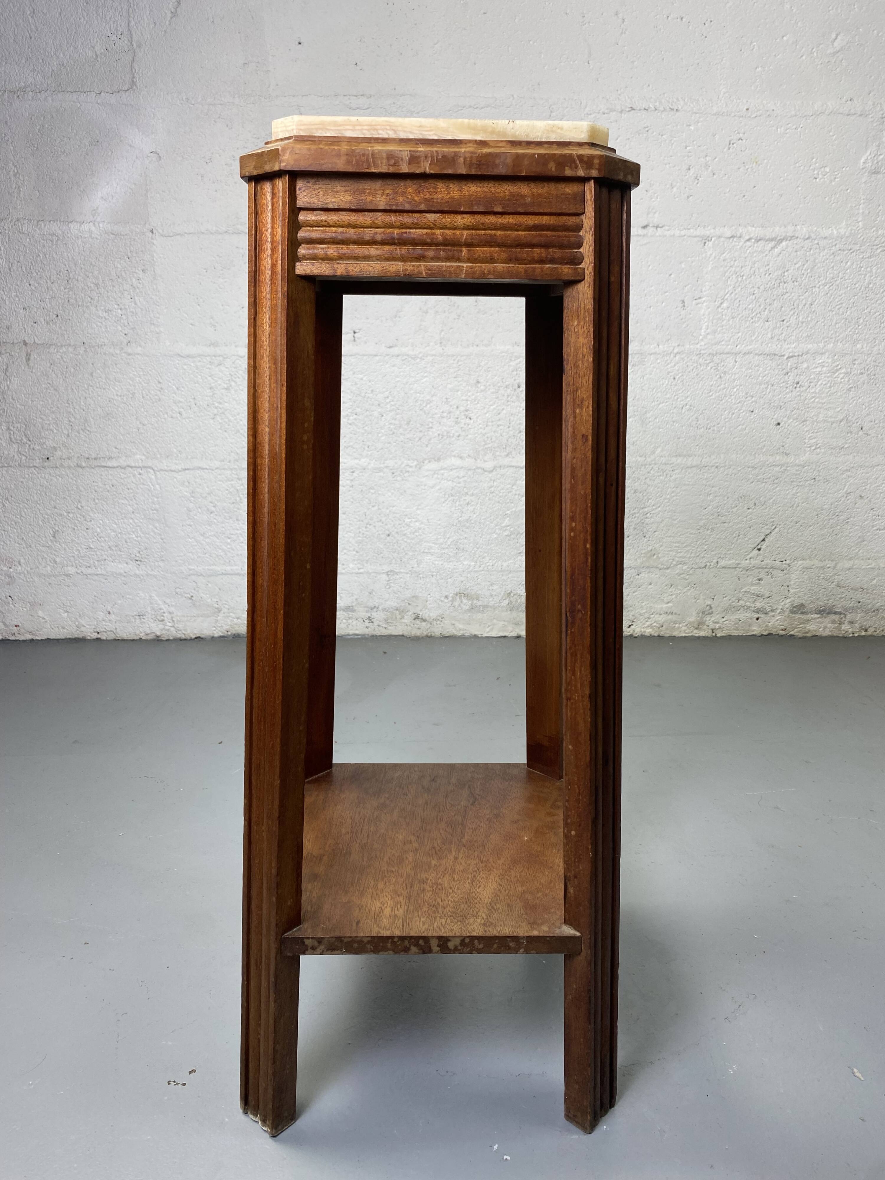 Wooden stool with marble top