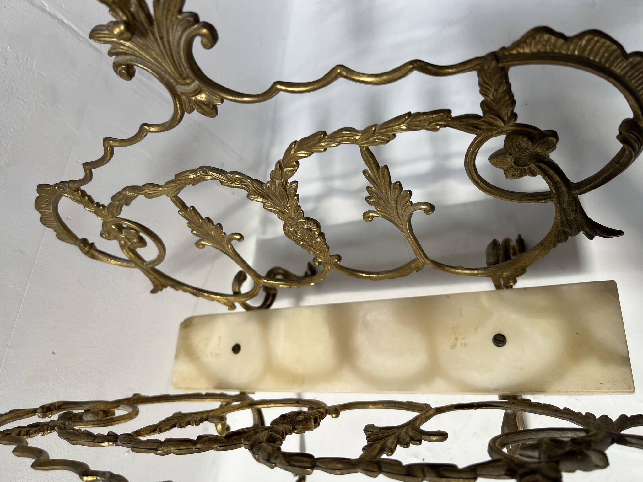 20th century openwork bronze and brass magazine rack