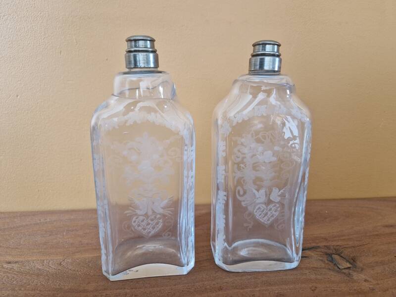 Pair of old engraved and frosted glass bottle vases.