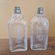 Pair of old engraved and frosted glass bottle vases.