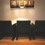 6 faux leather chairs on wheels