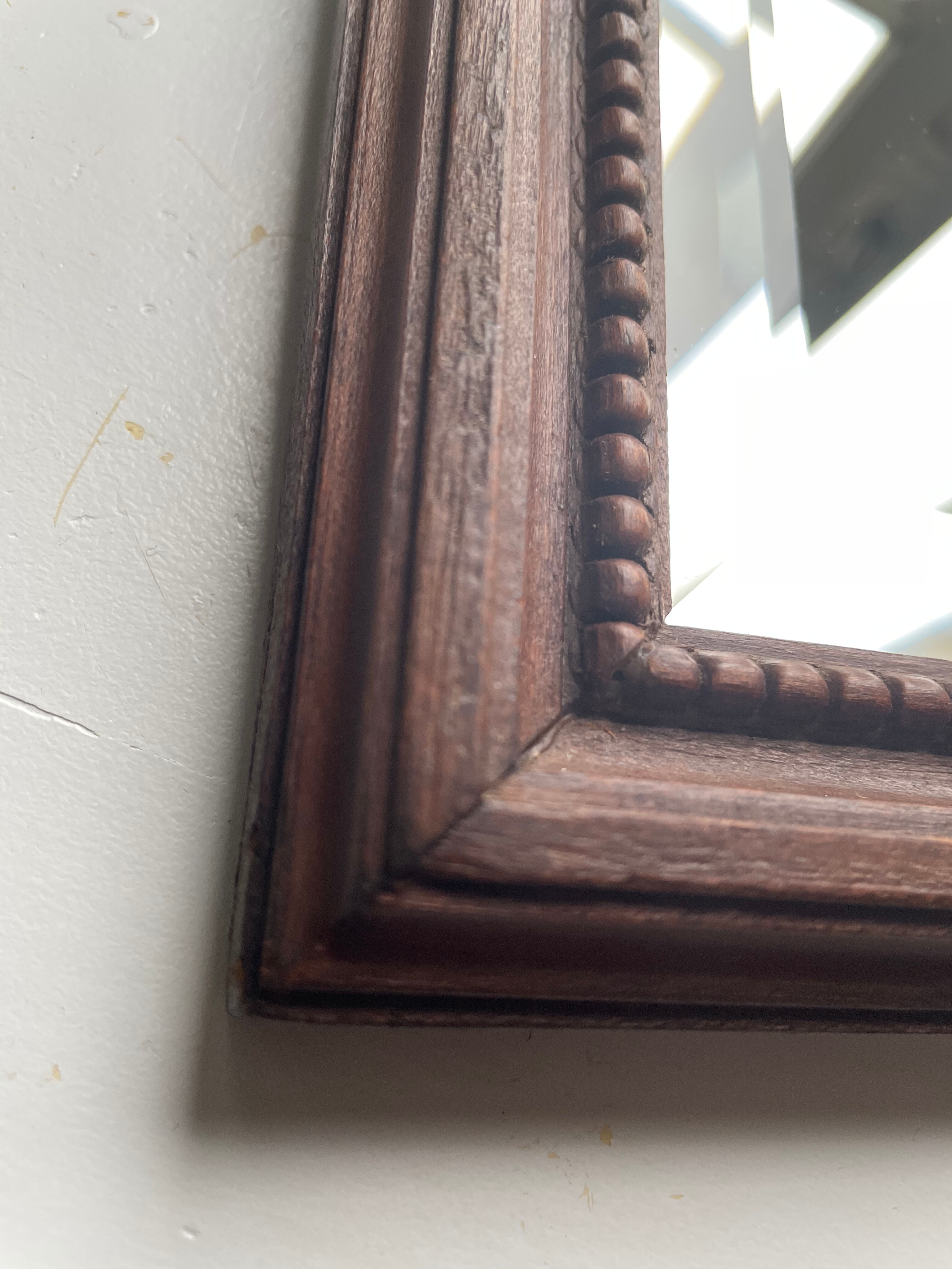 Bevelled mirror frame carved wood