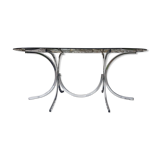 Oval table in smoked glass and metal foot