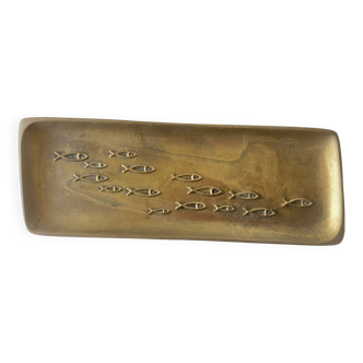 Bronze pocket emptier with fish decoration.