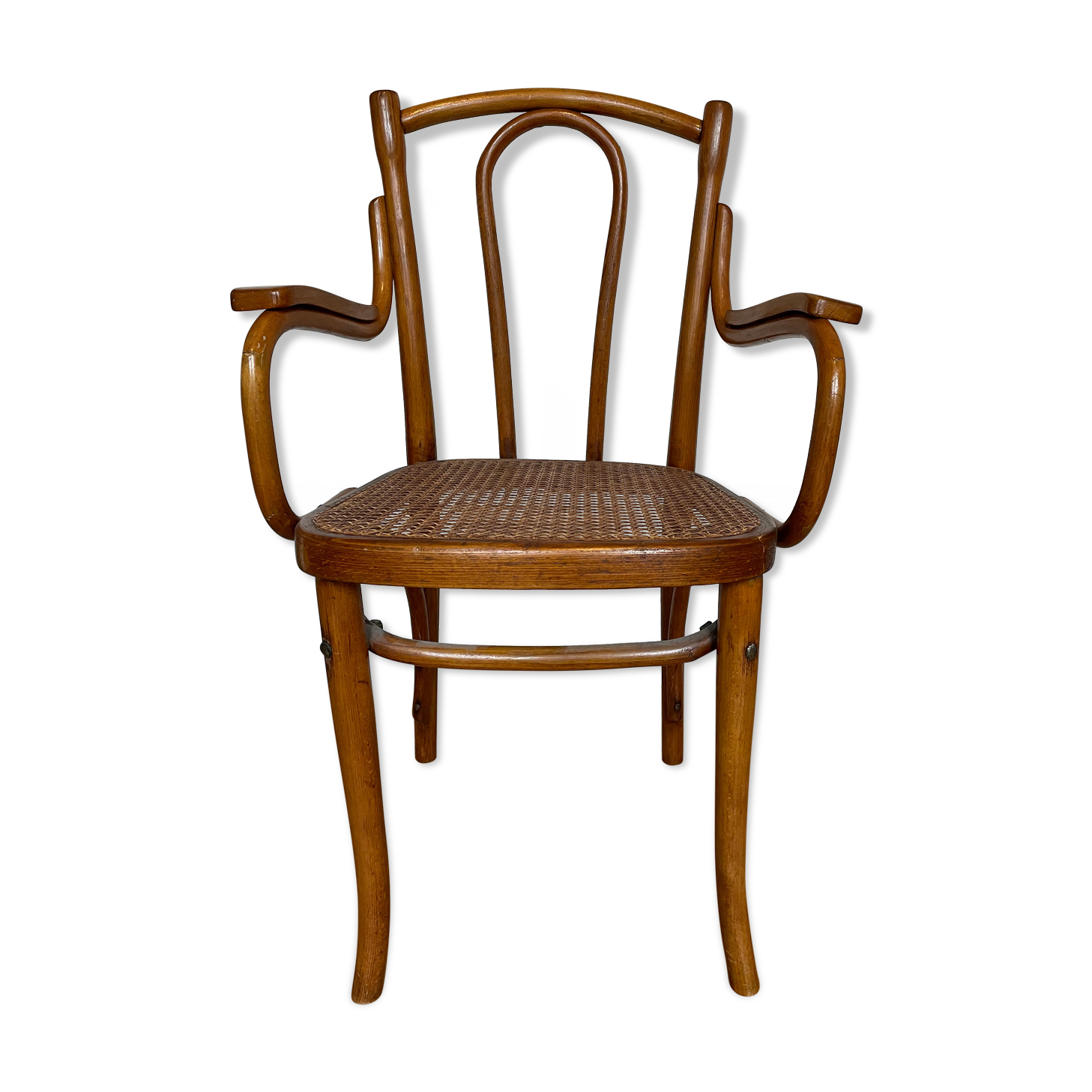Old thonet armchair in curved wood and rattan cane