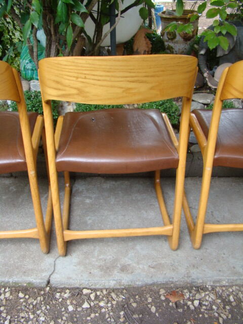 Series of four baumann sleigh chairs