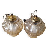 Two Globe chandeliers in molded glass in a beautiful amber color