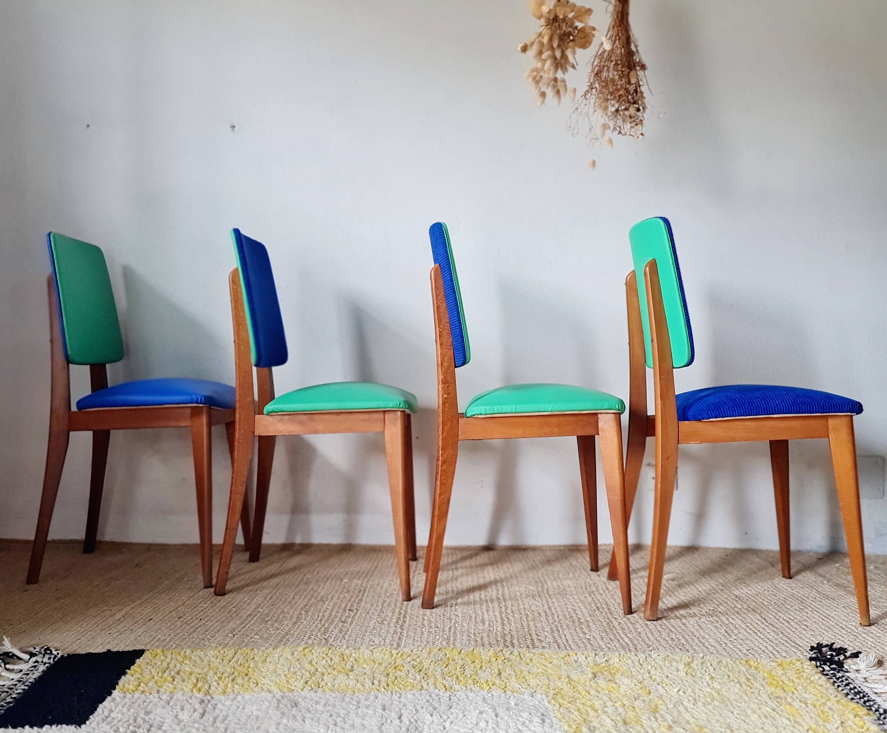 Series of velvet Scandinavian chairs - green and blue.