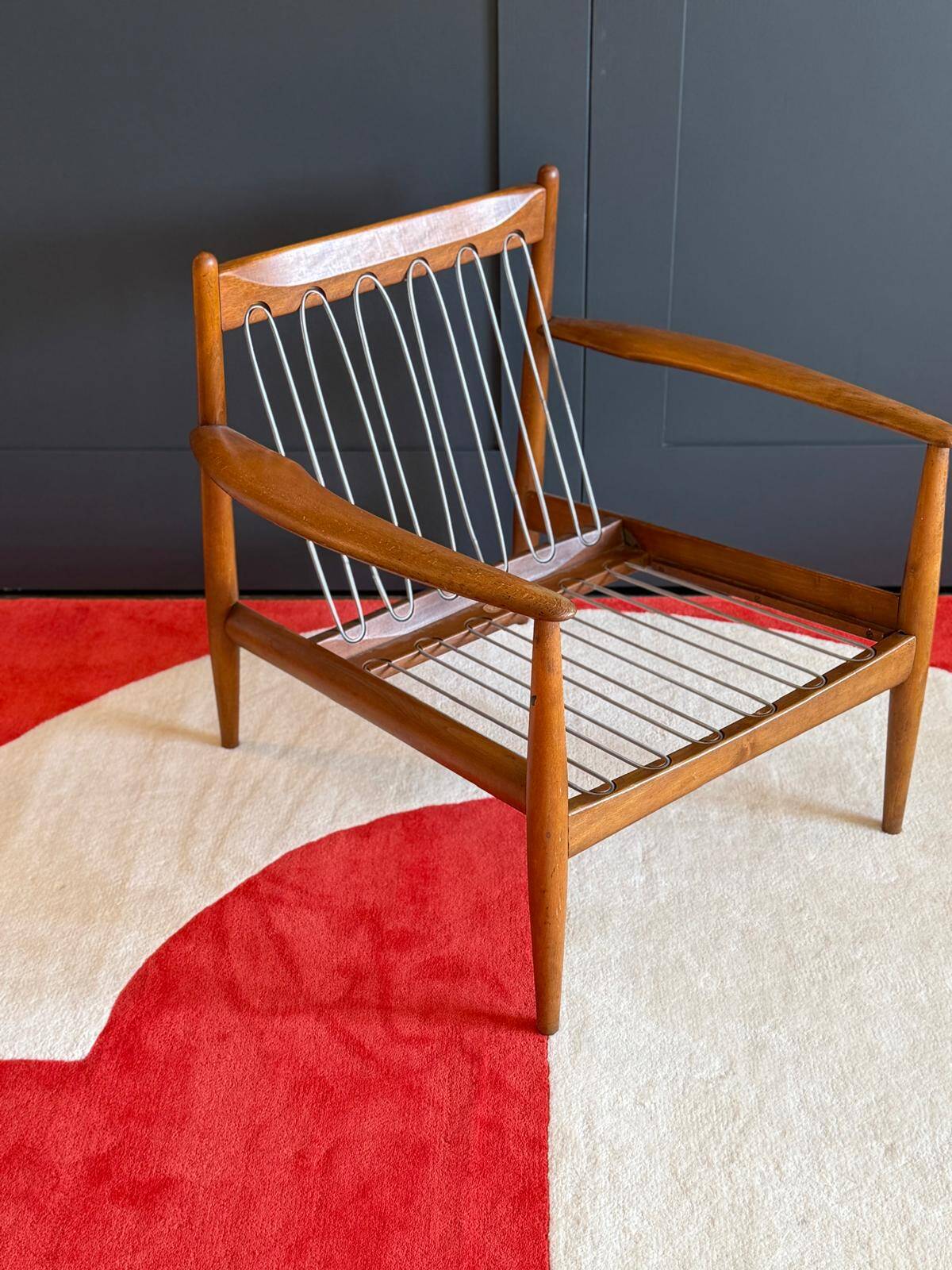 Scandinavian armchair in solid teak by Grete Jalk