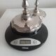 Pair of silver-plated metal candlesticks