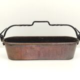 Copper planter and wrought iron handle