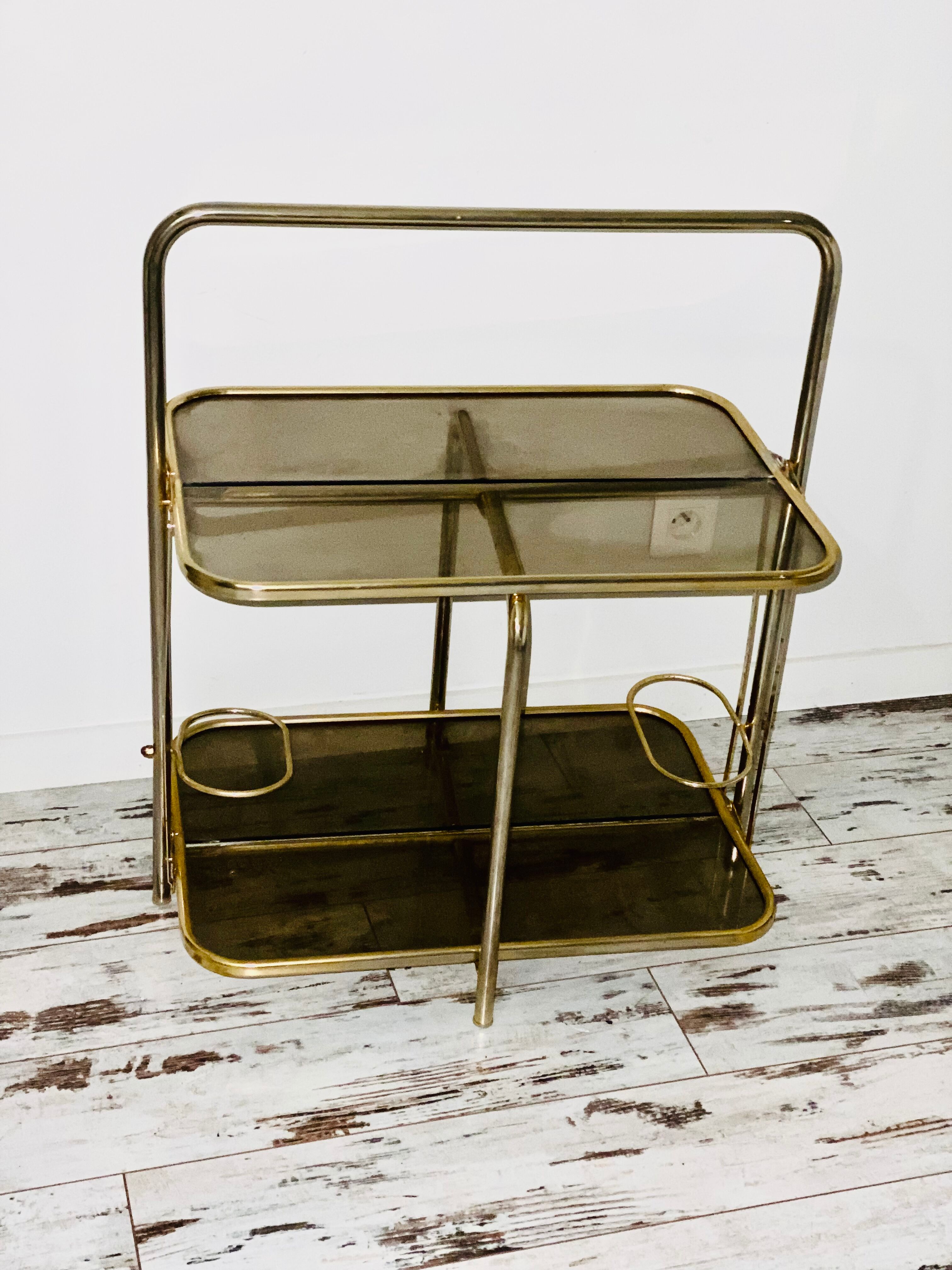 Golden tubing bar and smoked glass top circa 60/70