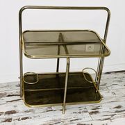 Golden tubing bar and smoked glass top circa 60/70