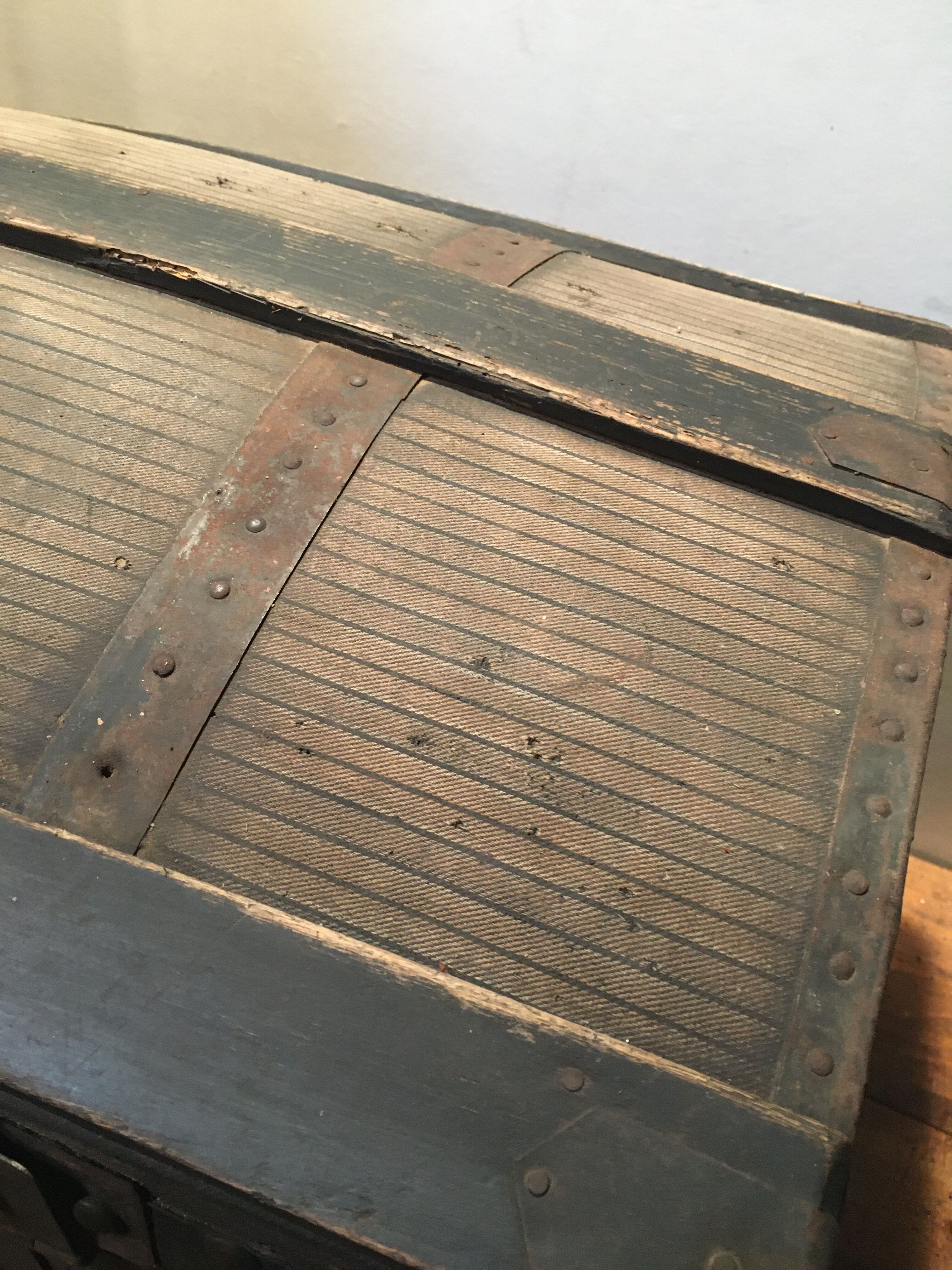 Black travel trunk with a fabric top