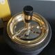 Black ashtray and gold gold gold metal with Soveno wheel