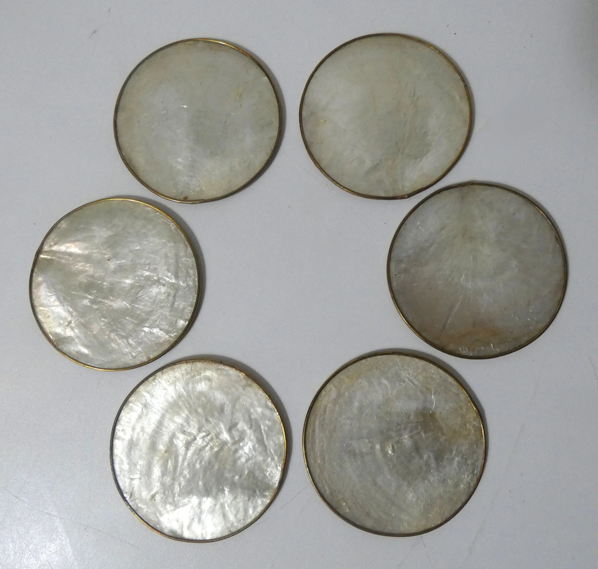 set of 6 vintage mother-of-pearl and brass coasters