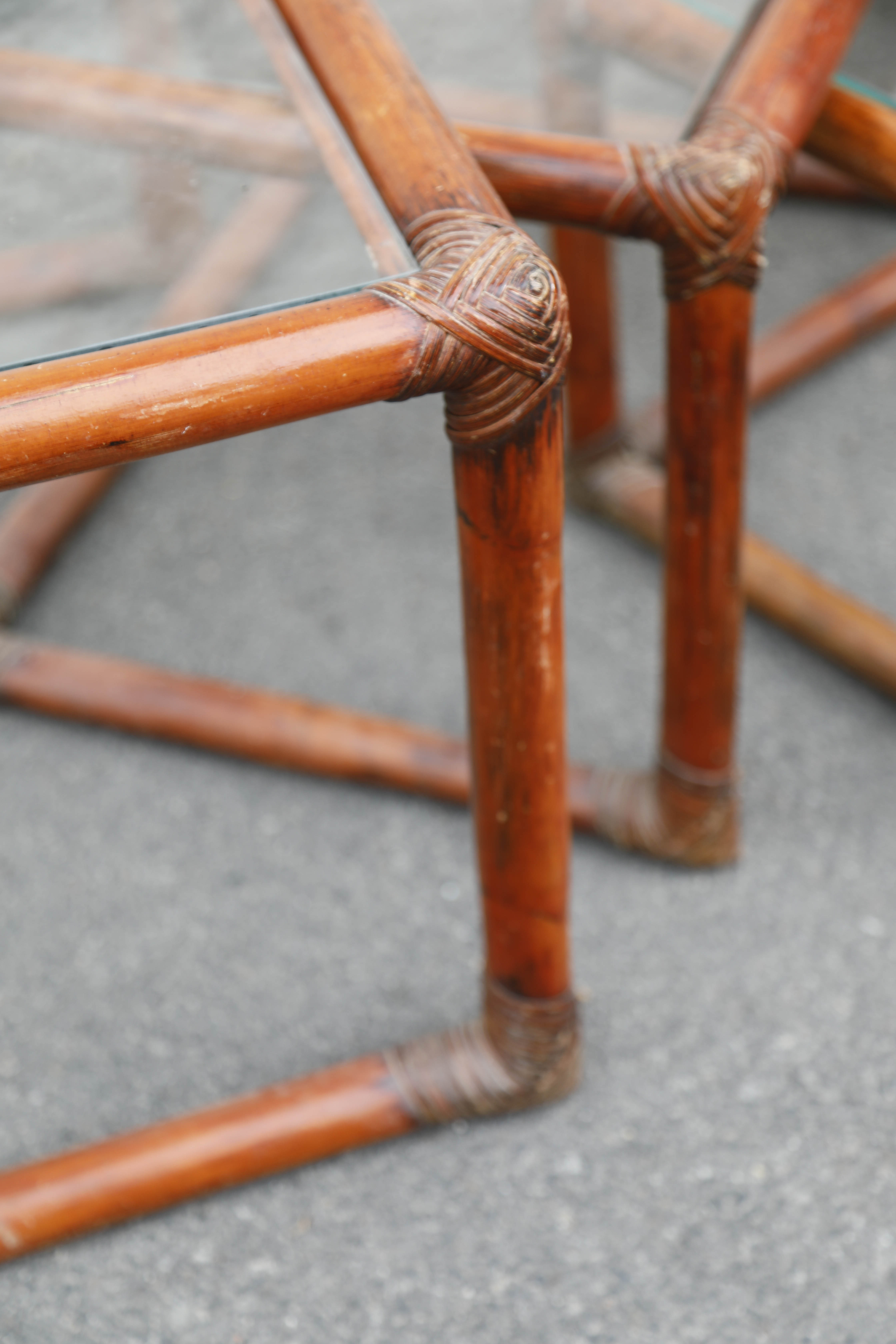 Rattan and glass side tables