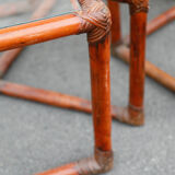 Rattan and glass side tables
