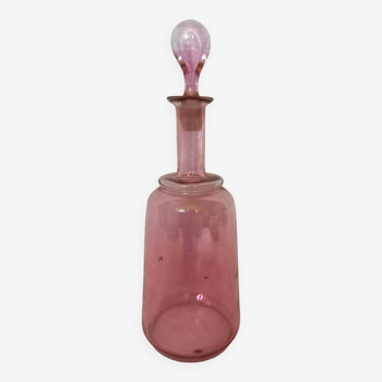 Perfume or eau de toilette bottle, in pink blown glass, vintage