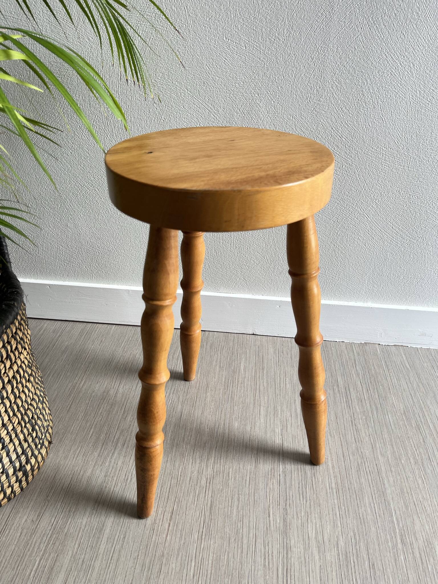 Wooden tripod stool
