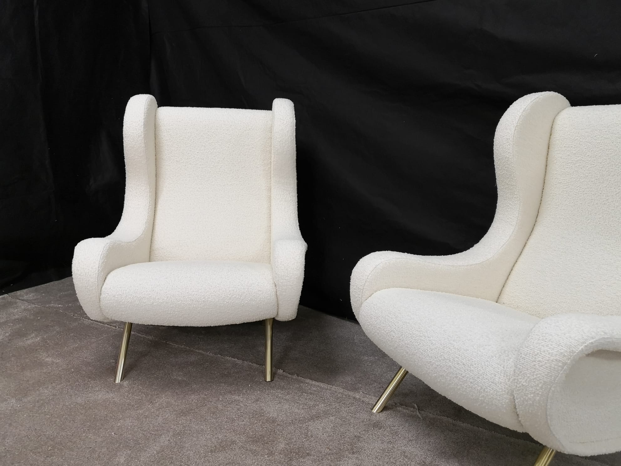 Pair of white buckle chairs