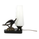Art Deco lamp with swallow sculpture, marble base, opaque white globe.