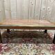 Contemporary coffee table in mahogany and marble.
