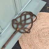 Cloakroom with sage green wall coats