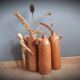 Trio of sandstone bottles