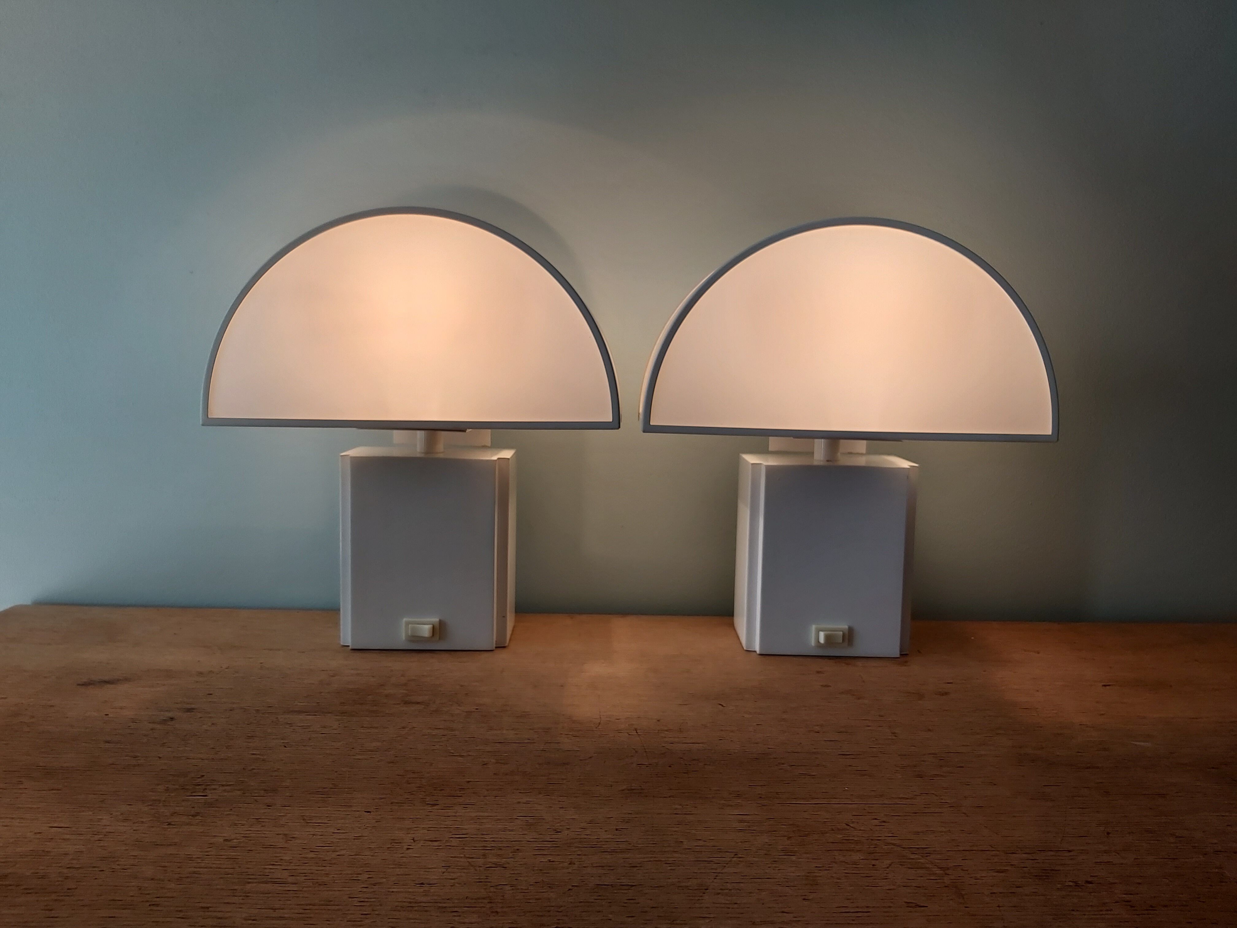 Pair of wall lamps, Olympus model, Harvey Guzzini, 70s