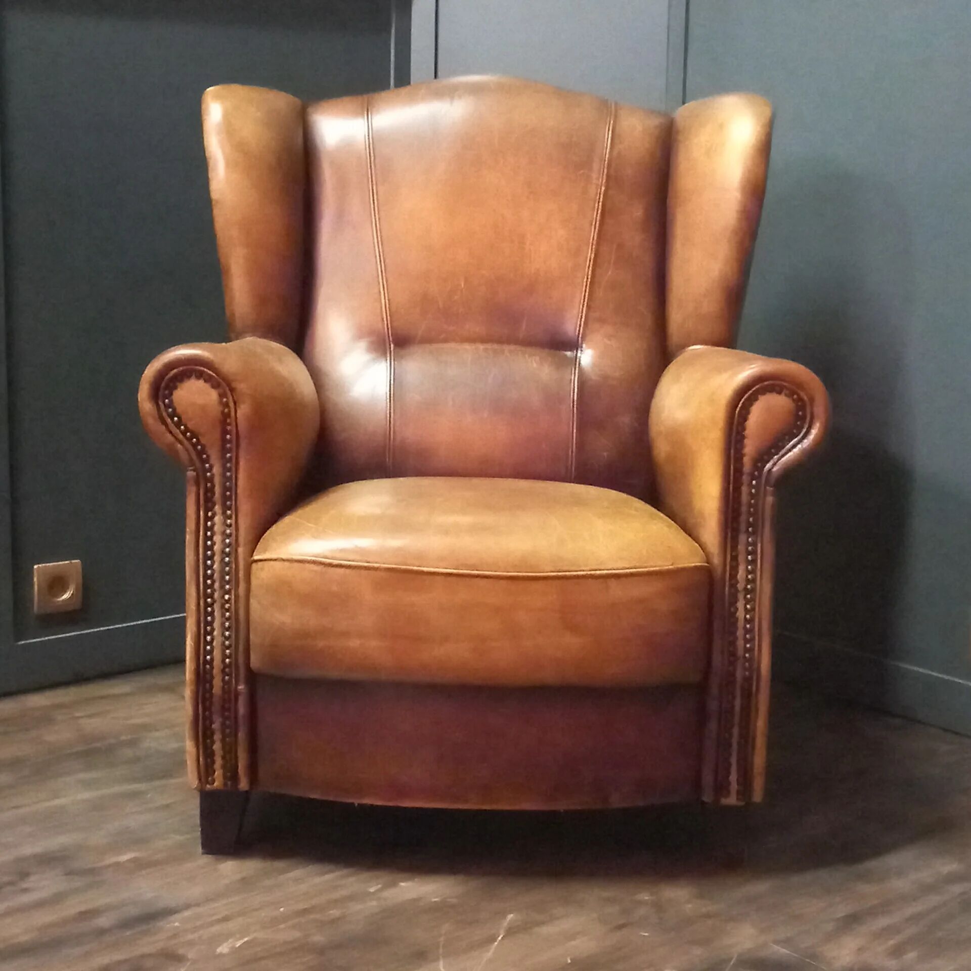Robust vintage sheepskin armchair