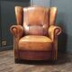 Robust vintage sheepskin armchair