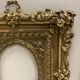 Pair of brass photo frames