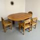 Extendable round table Maison Regain in solid elm, 1970s design.