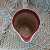 Antique earthenware pitcher