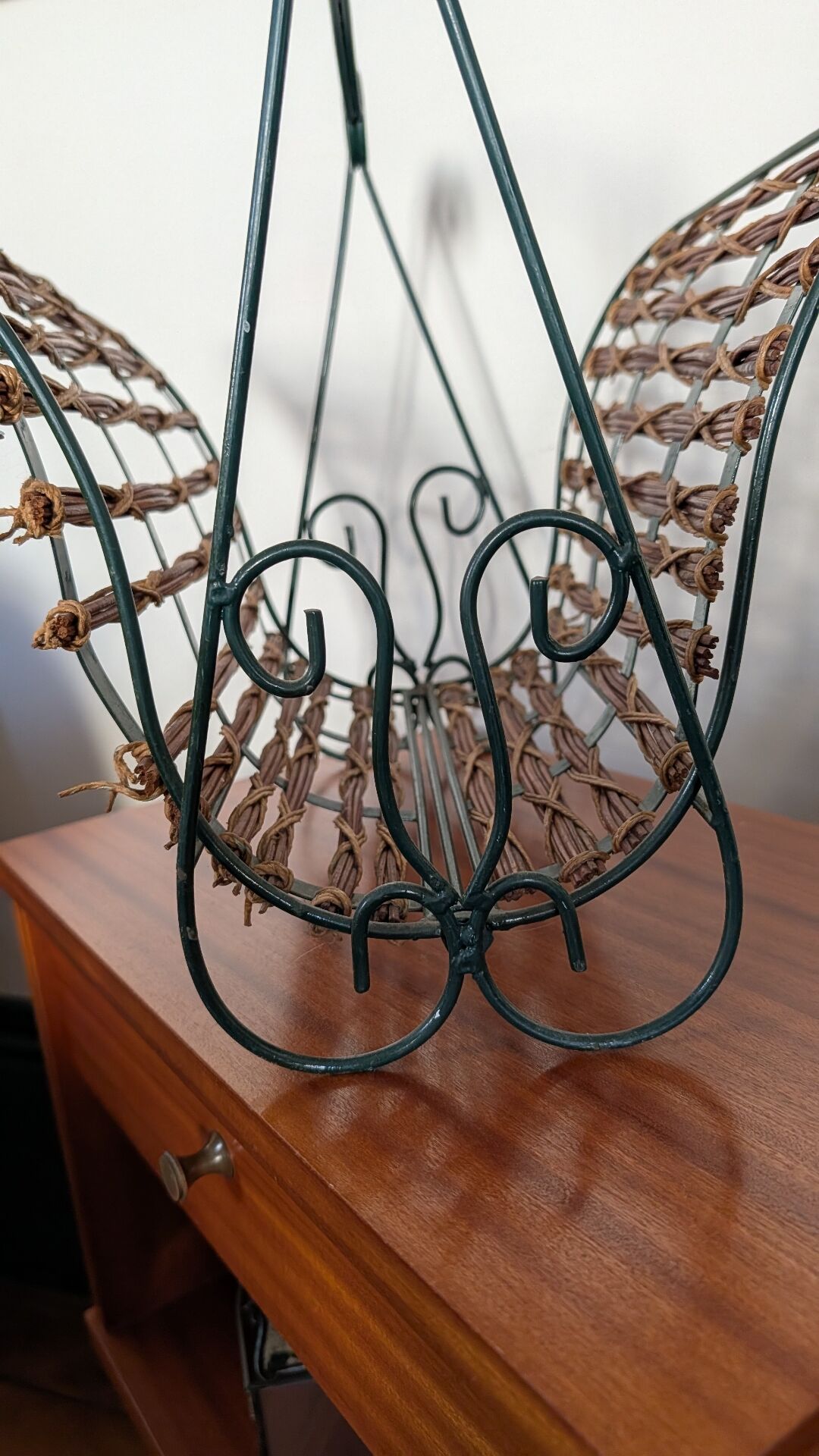 Metal and woven rattan magazine rack from the 60s.