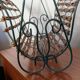 Metal and woven rattan magazine rack from the 60s.