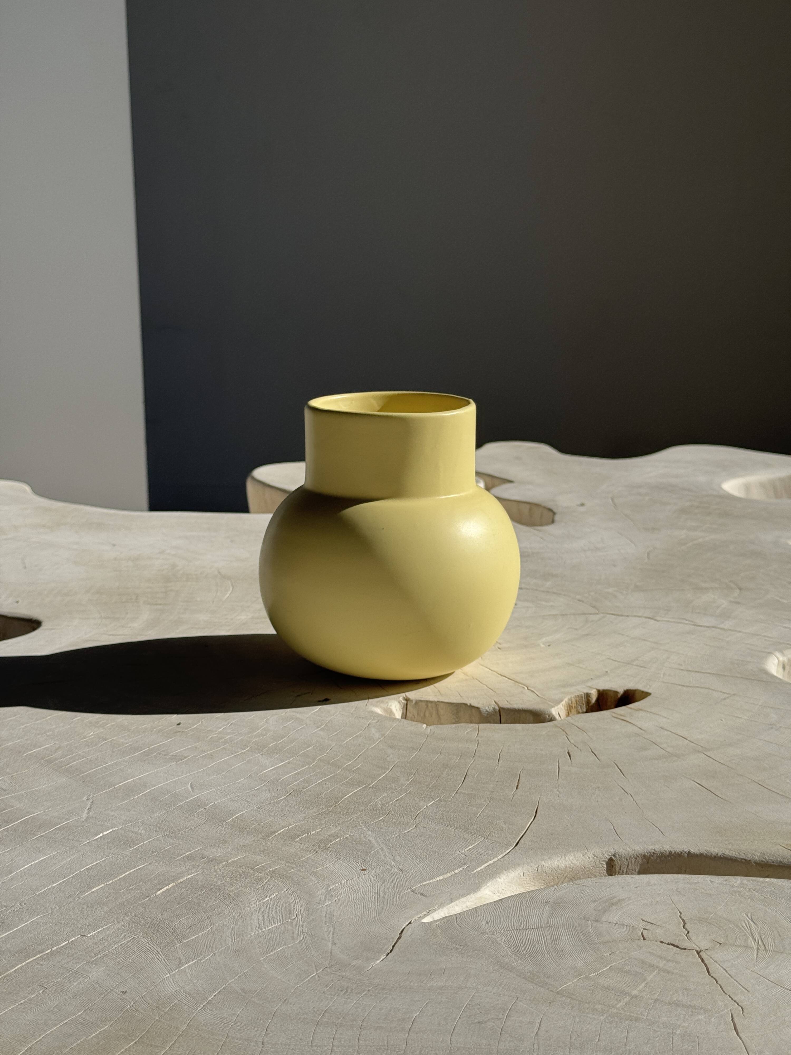 Small light yellow ball vase
