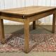Extendable oak table from the 1930s with Gothic decoration.