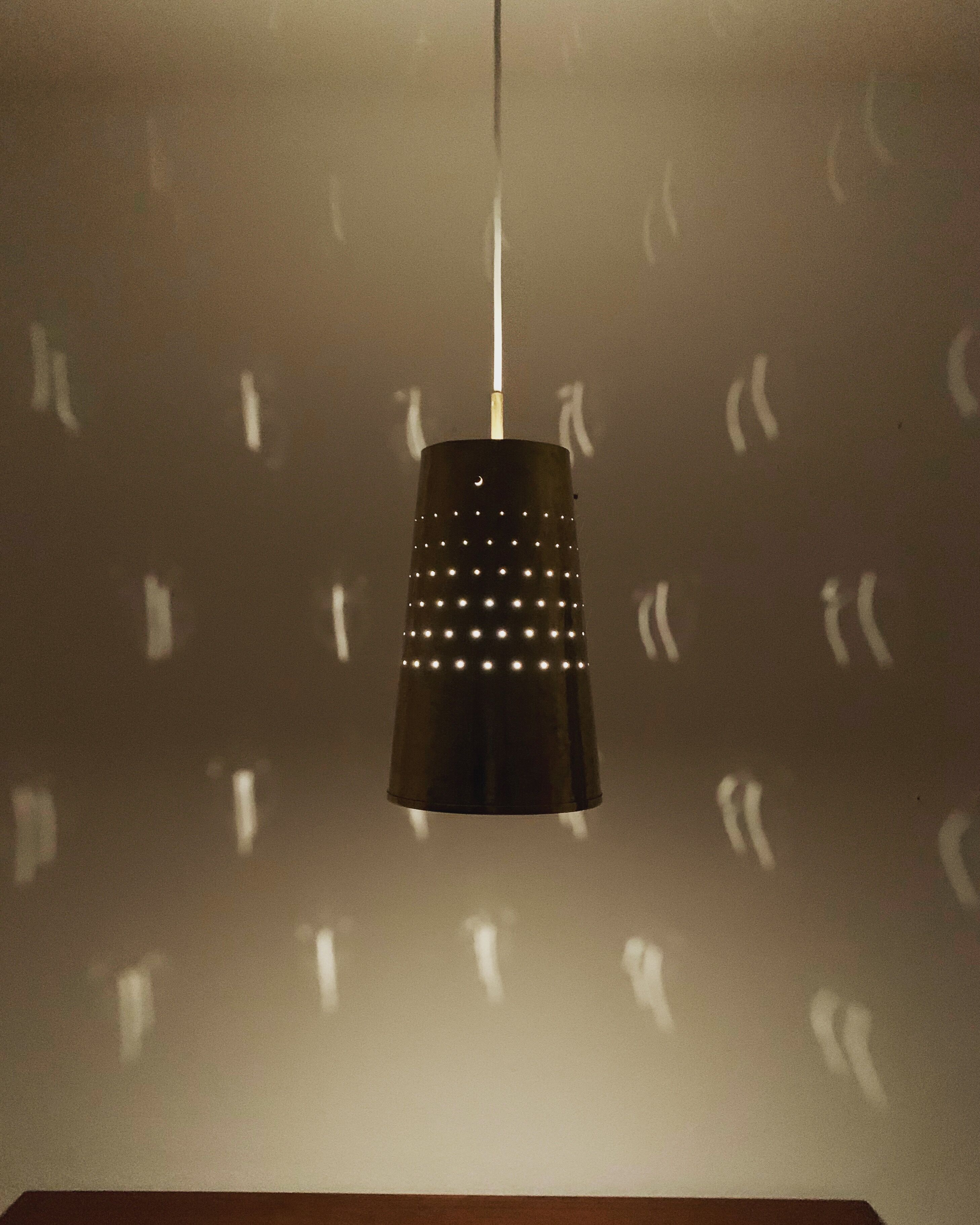 Set of 2 large Mid Century Modern perforated brass pendant lamps