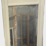 Louis XVI style mirror in wood and patinated stucco 20th century