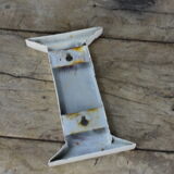 White zinc letter "i"