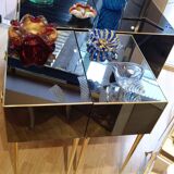 Pair of nightstands in anthracite colored glass and brass