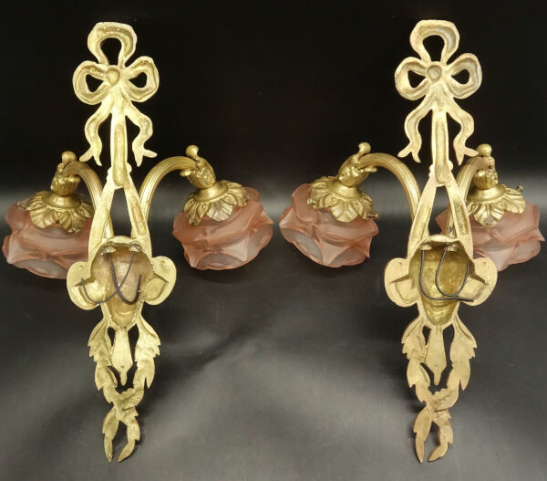 Pair of sconces with the heads of Zephyr Louis XVI style